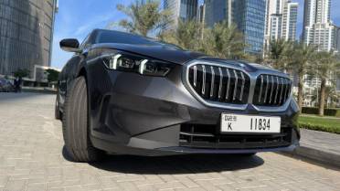 Rent a car with driver in dubai BMW 520i 2024